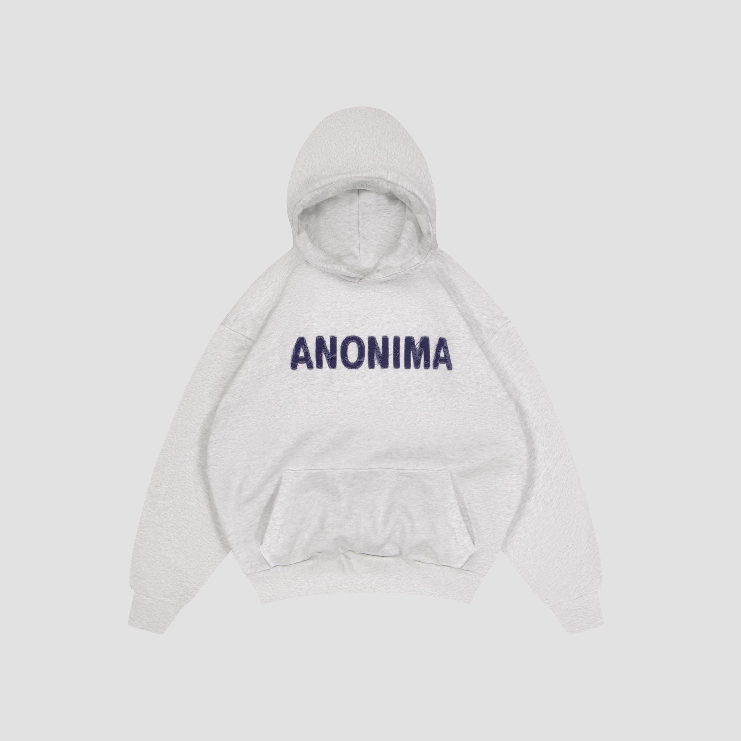 Flat Lay of White hoodie with 'ANONIMA' text on a light gray background