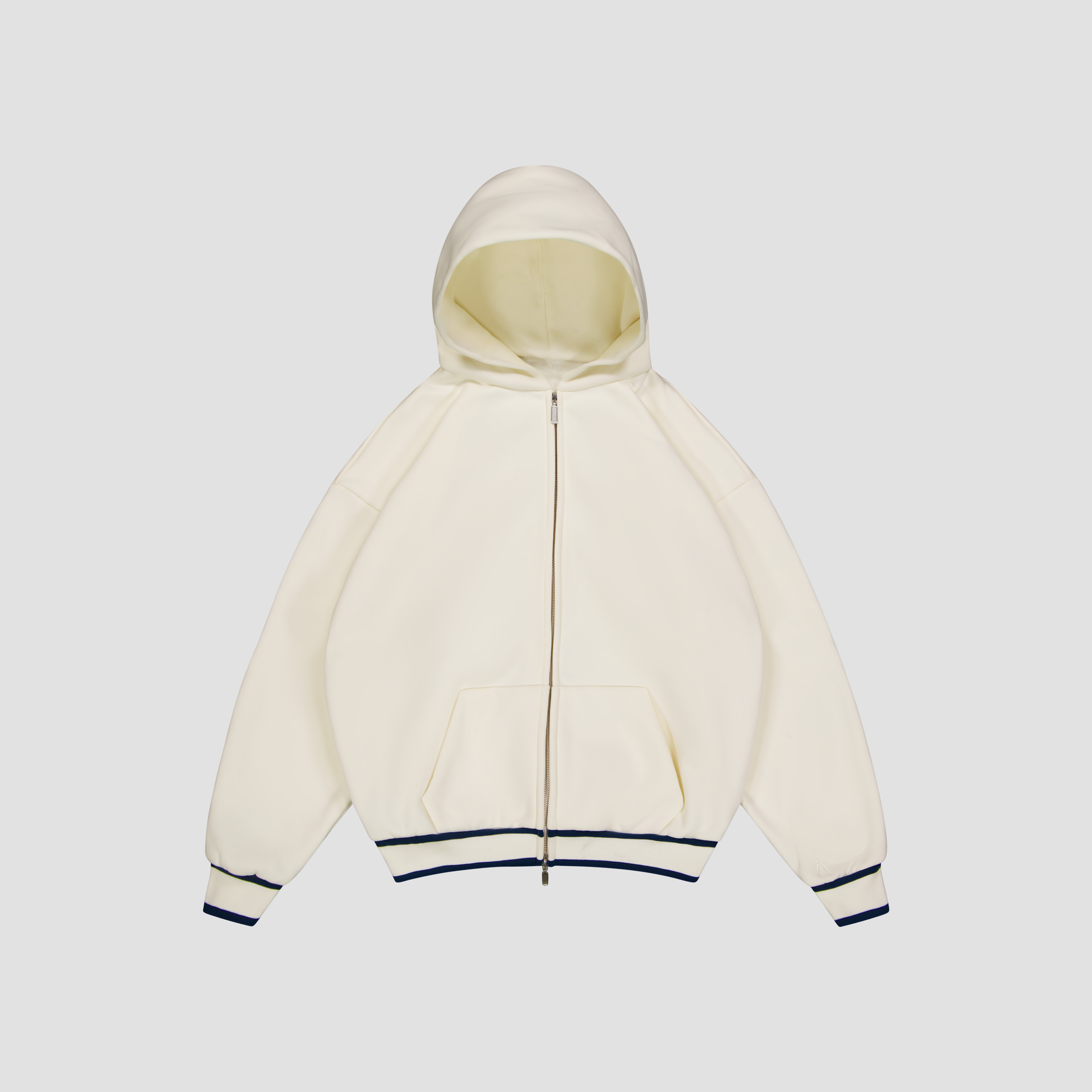 Flat Lay of White hoodie with navy trim on a light gray background