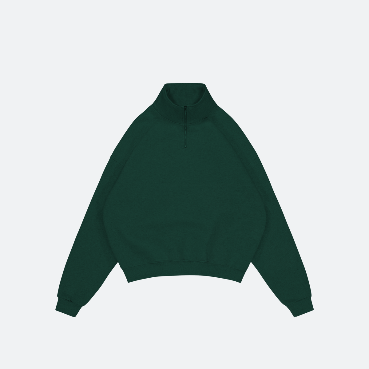 Flat lay of British racing green quarter-zip sweatshirt on a light gray background