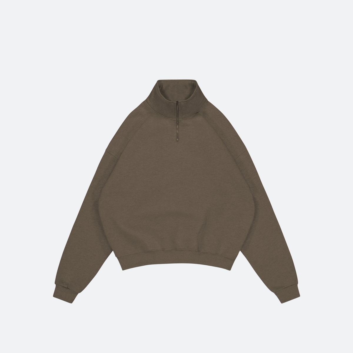 Flay lay of shadow grey quarter-zip sweatshirt on a light gray background