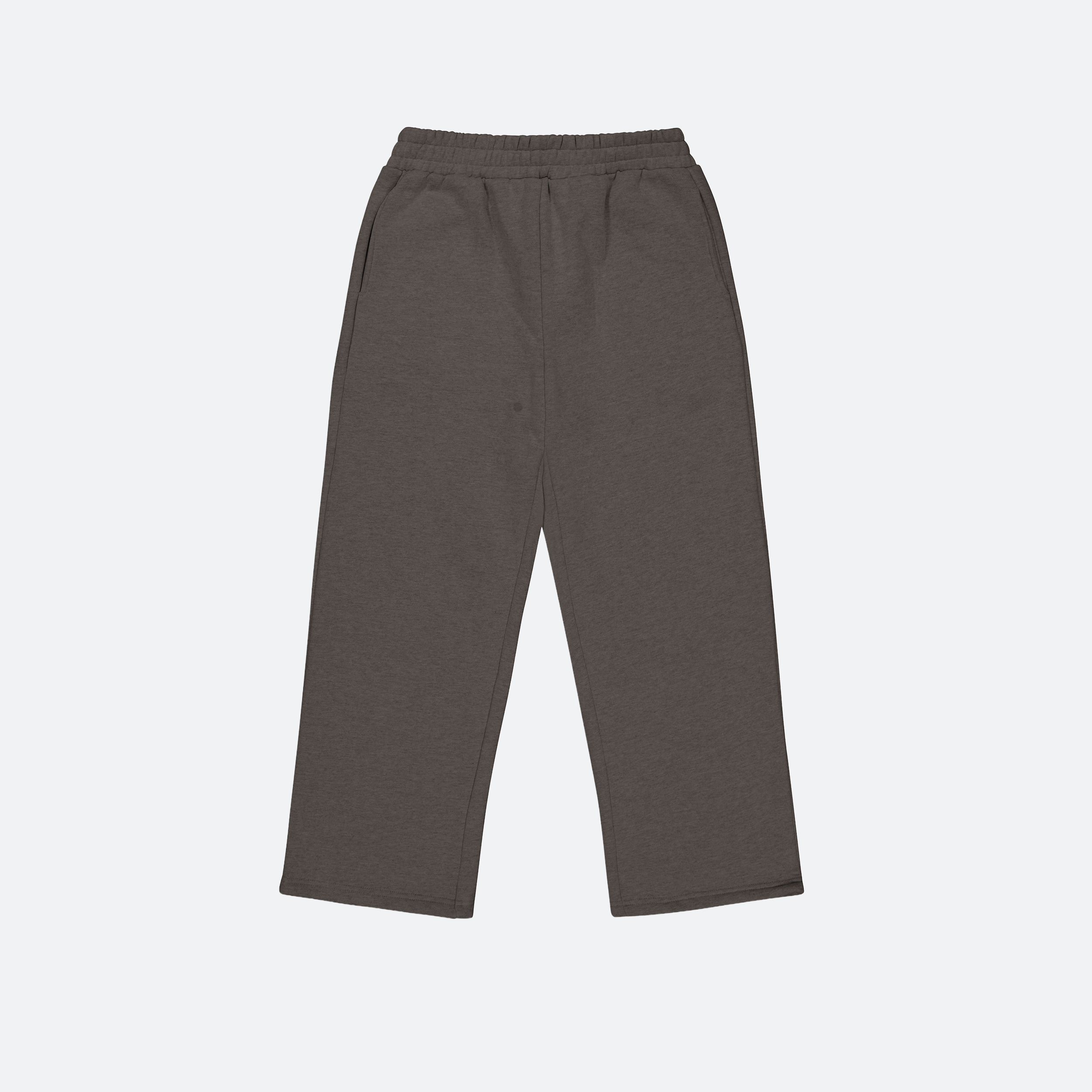 Flat lay of shadow gray track pants on a light gray background